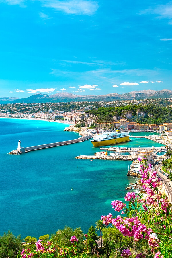 Beautiful views of Nice port with flowers in background