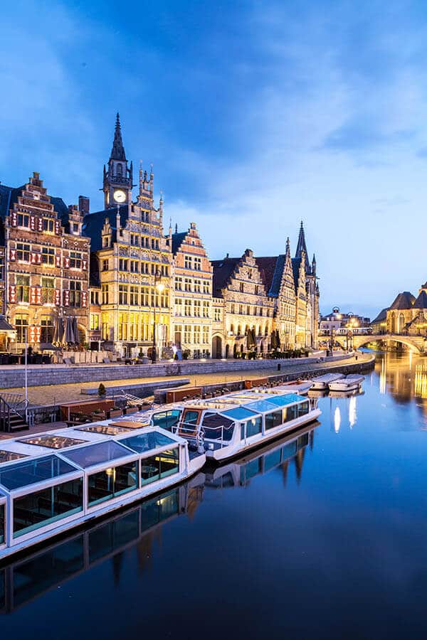 Beautiful view of Ghent at night, one of the best places to visit during a week in Belgium! #travel #ghent #gent #belgium