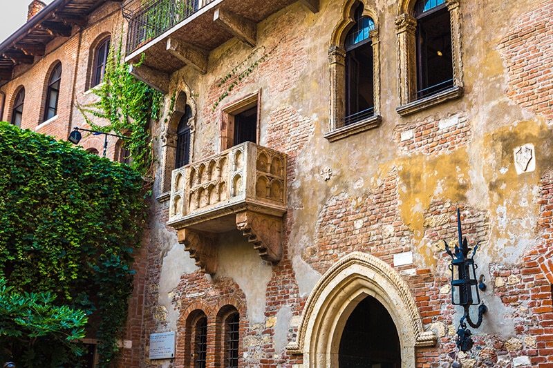 Juliet's balcony in Verona, Italy during a romantic honeymoon trip in Italy