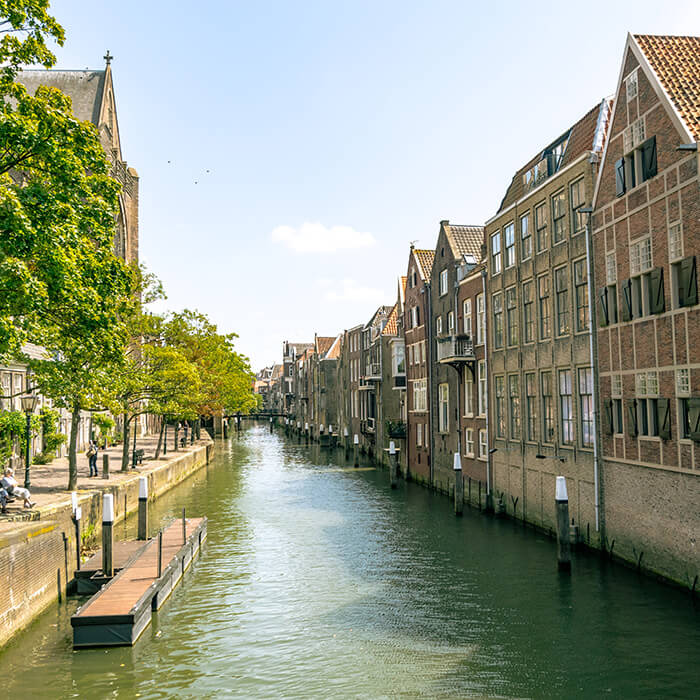 Beautiful warehouses in Dordrecht, the Venice of Holland. Be sure to include this beautiful city in your week in the Netherlands! #travel #netherlands #holland