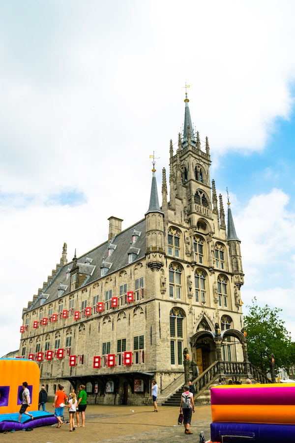 Gouda City Hall, one of the must-see attractions in Gouda, a day trip from Amsterdam. The Gouda Cheese Market happens in front of here every Thursday during the summer. #travel #gouda #netherlands #holland
