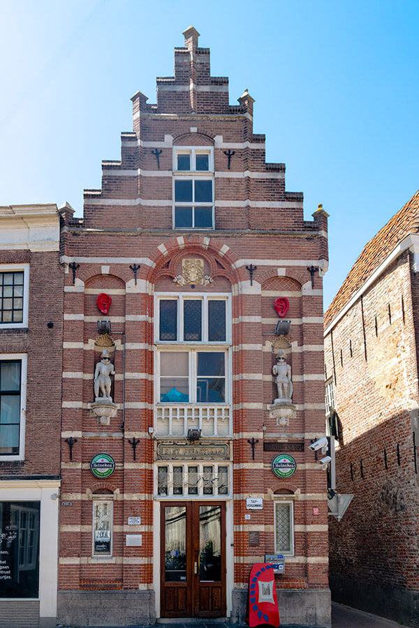 Beautiful house in Middelburg, the Netherlands with funny statues. #travel #netherlands #Nederland