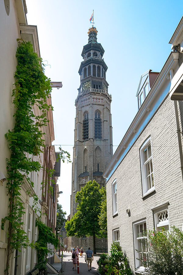 View of a beautiful street in Middelburg with a view of Lang Jan, one of the iconic attractions in Middelburg, the Netherlands. #travel #middelburg #nederland