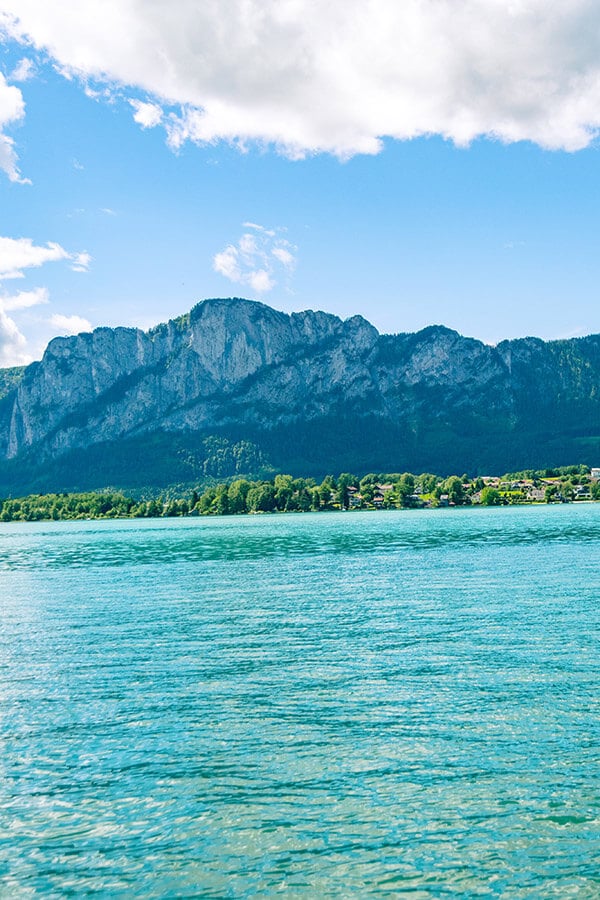 Beautiful alpine lake in Austria. Read about visiting Austria without spending a lot of money! #travel #austria #europe