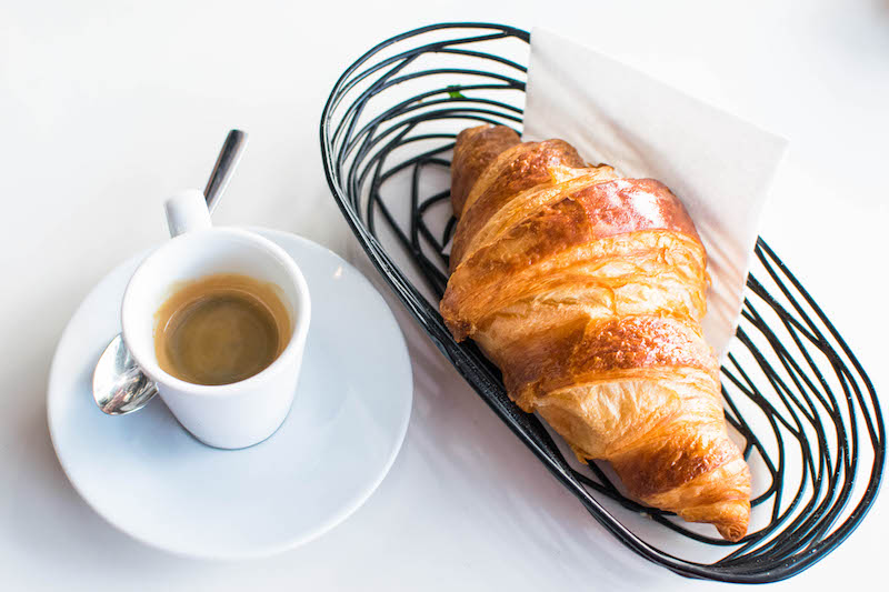 French breakfast at a French cafe, something that you must include on your Paris itinerary! #travel #food #croissant