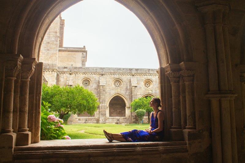 Girl enjoying a beautiful view of Evora, one of the weekend trips from Lisbon