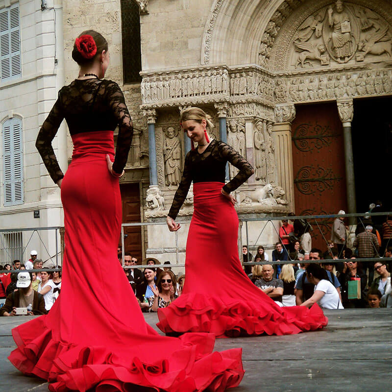 Flamenco dancers during Easter festivities in Arles, France.