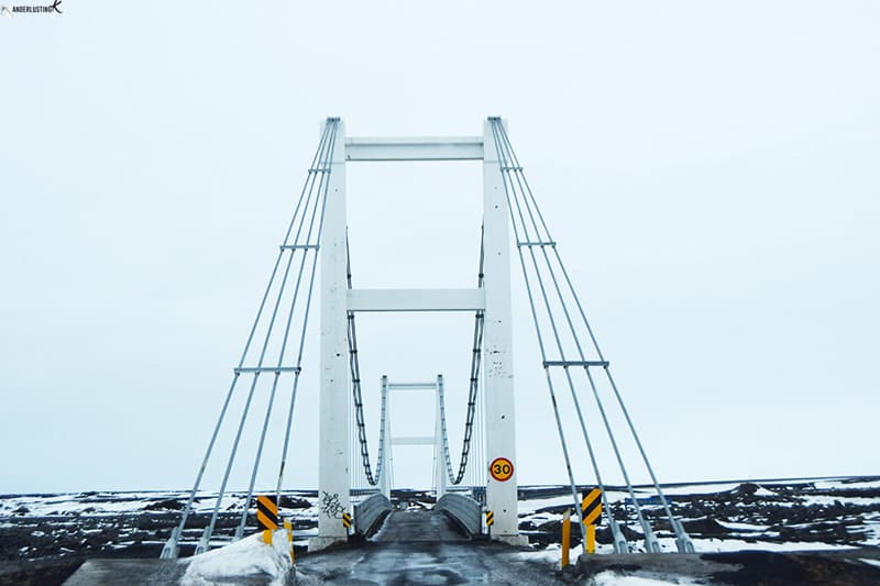 Photo of one lane bridge in Iceland. Find out driving tips for driving in Iceland for your road trip in Iceland.