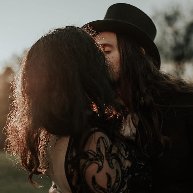 Happy couple kissing celebrating their renewal of vows at a post elopement reception celebration. #weddings #elopement