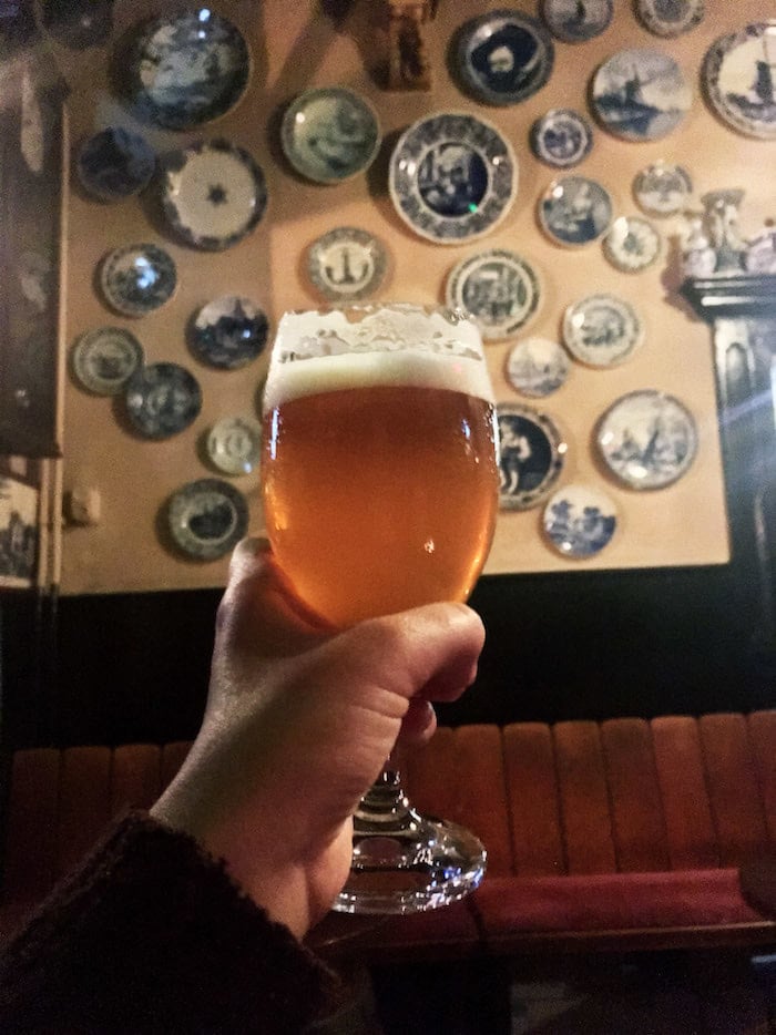 Beer at the oldest bar in Delft, De Klomp. Read about where to have a beer in Delft and the best things to do in Delft! #Travel #Beer #Delft #Netherlands