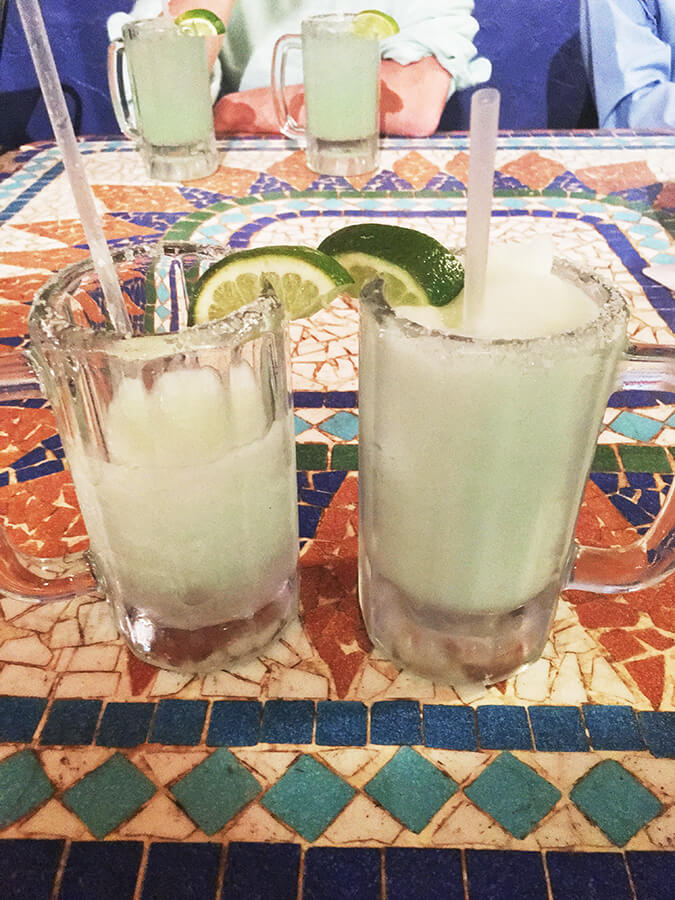 Two margaritas. Read how much you should tip at a cafe or bar in the United States as a traveler! #travel #USA