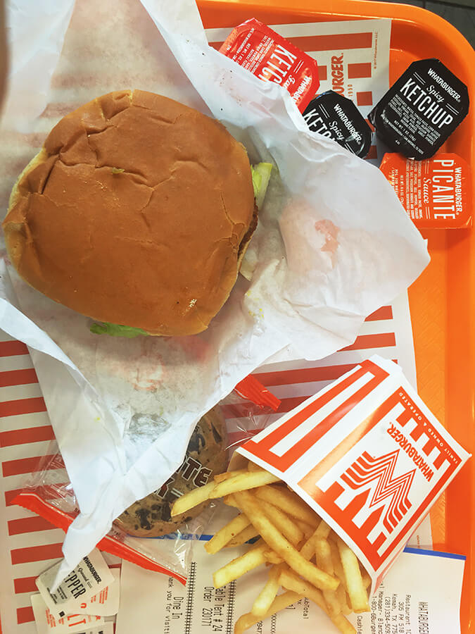 A late night meal at Whataburger, a Texas chain: one of the foods that you should be on your foodie bucket list (past midnight). #travel #food #houston #texas