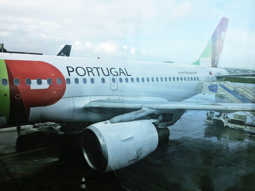 TAP Portugal plane. Read an honest review of flying from JFK to LIS with TAP Portugal Airlines in economy class. #travel #Lisbon #Portugal