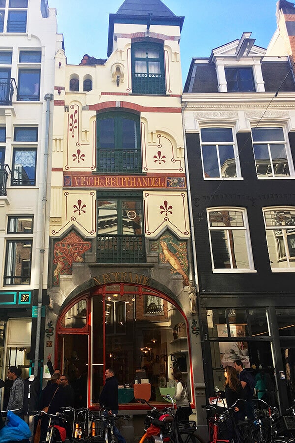 Beautiful storefront along Haarlemmerstraat in Amsterdam.  This charming shopping street is one of the most beautiful streets in Amsterdam not to miss! #travel #amsterdam #holland #netherlands