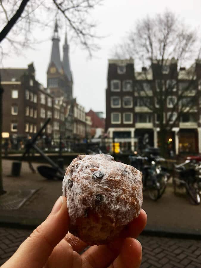 Oliebollen, a typically Dutch New Years food that you must try in Amsterdam, the Netherlands! #netherlands #holland #dutch #Amsterdam