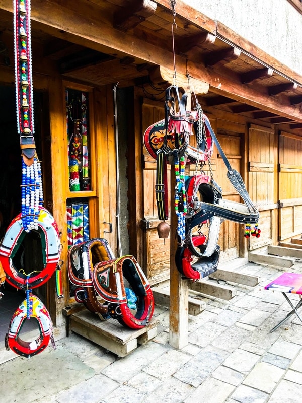 Photo of saddles in the Grand Bazaar in Gjakova Kosovo. Visit Gjakova for a beautiful market in Kosovo. #Kosovo #Gjakova