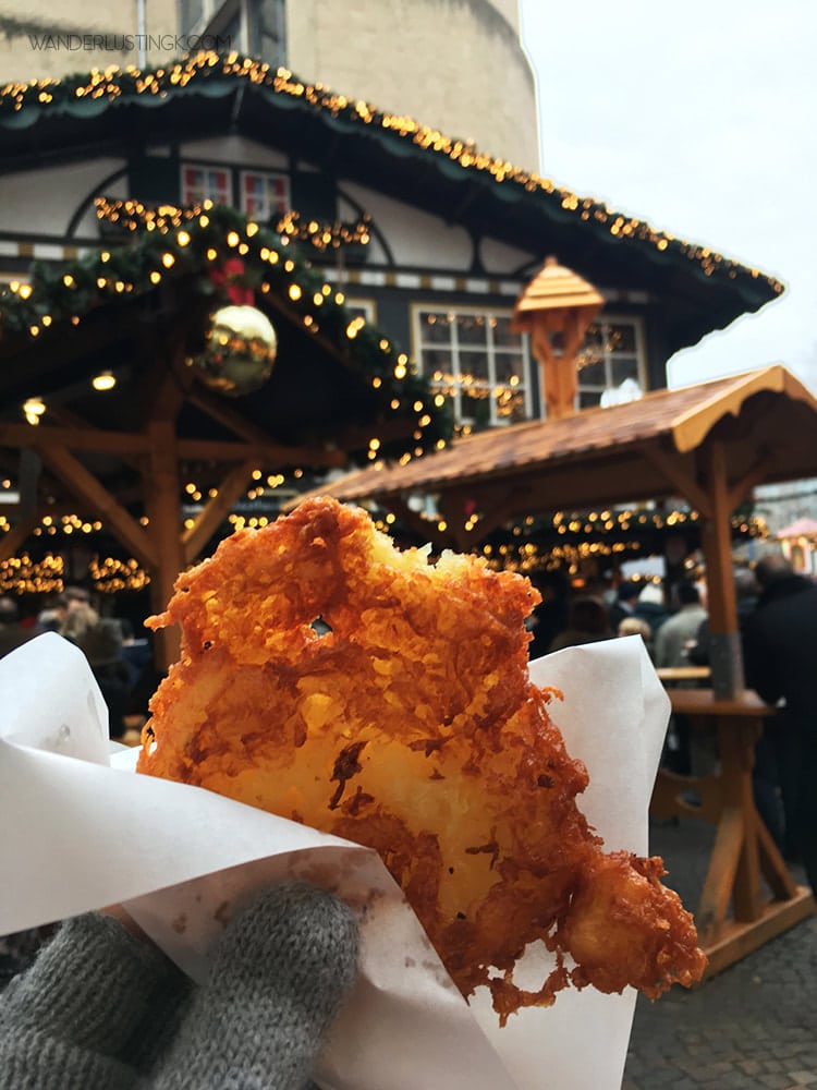 Photo of traditional potato Christmas food in Cologne. Read about the best things to do in Cologne in December including the Cologne Christmas markets.