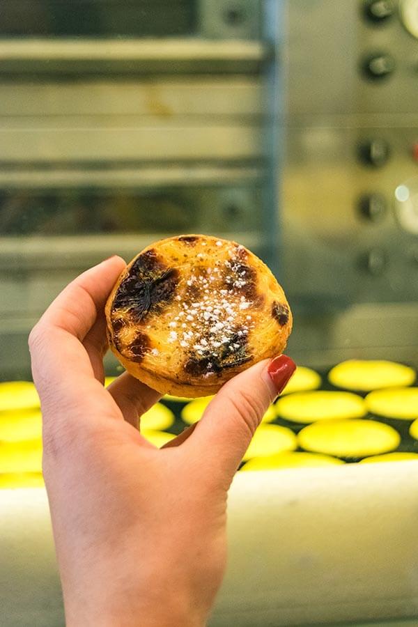 A portuguese custard tart from a bakery in Lisbon: one of the things that you must eat in Lisbon!