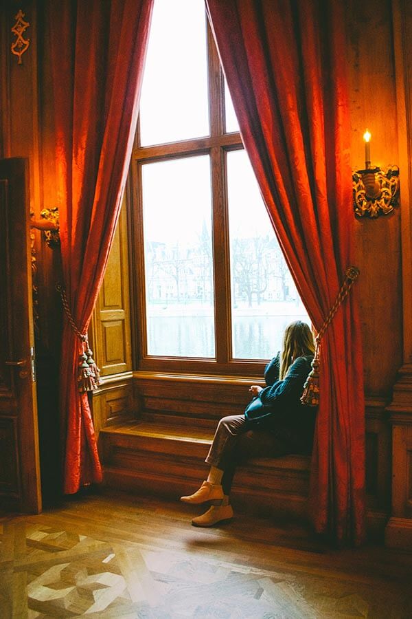 Girl enjoying views from the Mauritshuis museum in the Hague