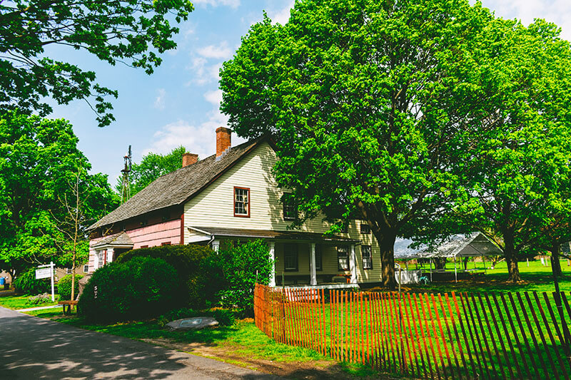 Sunny day at Queens County Farm, a historic farm in Queens.  This cheap thing to do in New York City is a family friendly favorite among New York families!