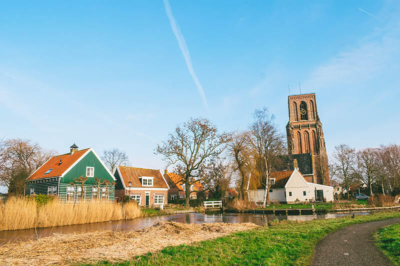 View of Ransdorp, including the Tower of Ransdorp. This cute village in Amsterdam is surrounded by fields!  #amsterdam #holland