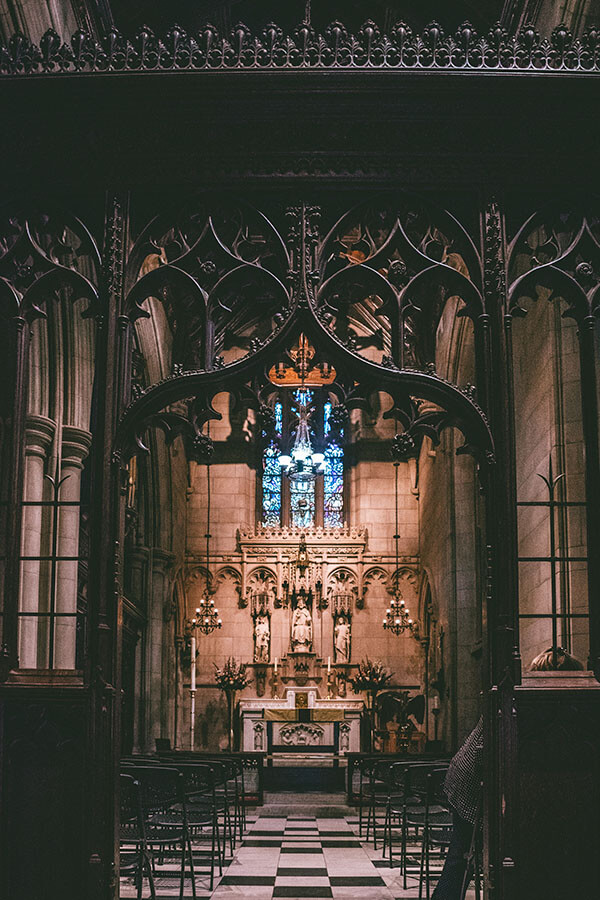 Interior of St. Paul’s Chapel of Trinity Church Wall Street, a historic church in New York with a beautiful wooden interior