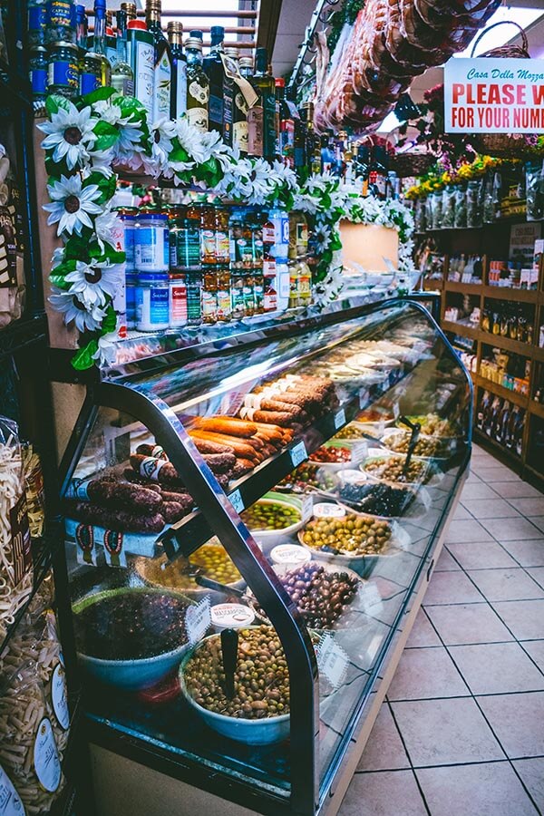 Interior of Casa Della Mozzarella, a well-known cheese and meat store in the Bronx