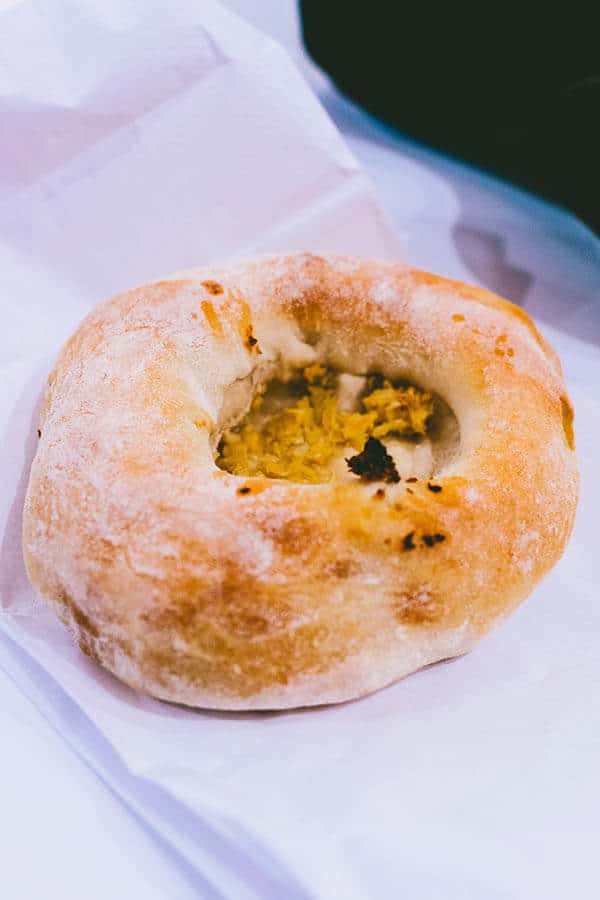 Bialy from Kossar's Bialys on the Lower East Side, one of the best places to try Jewish food in Manhattan