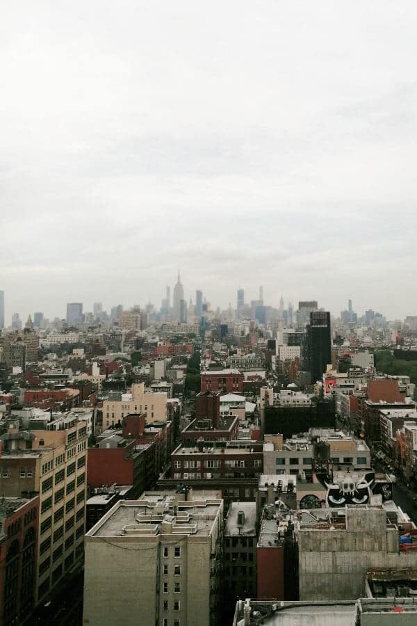 Rooftop views from a rooftop bar in Chinatown, Manhattan, New York City with Empire State Building in the distance