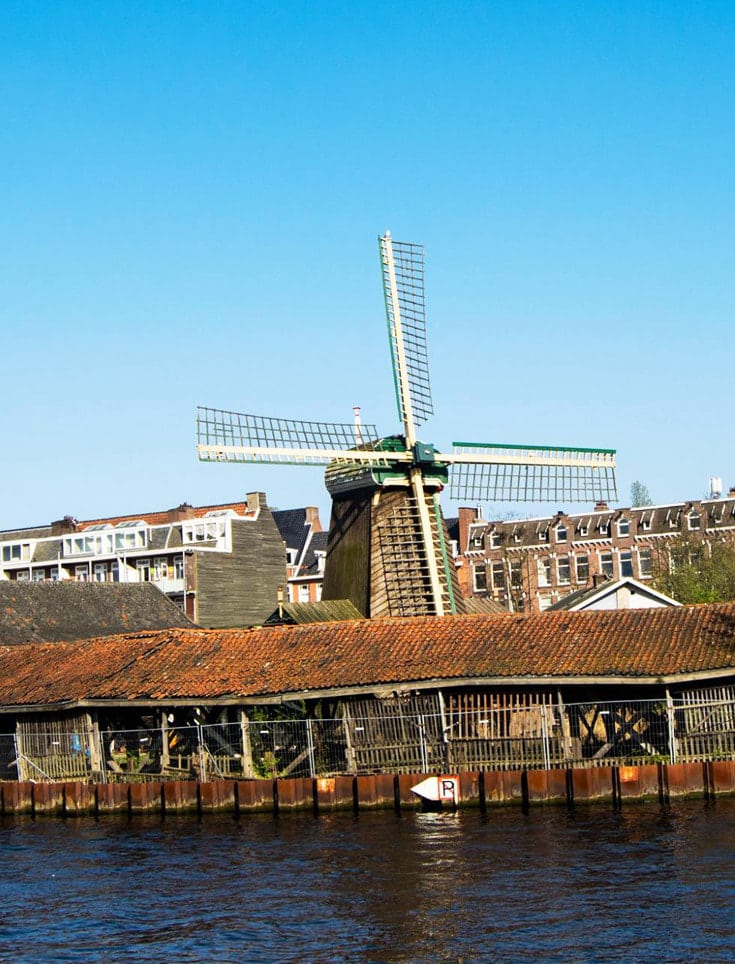 De Otter windmill in Amsterdam, one of the best secret places in Amsterdam to visit. Don't miss this Amsterdam secret spot when visiting Amsterdam! #travel #Amsterdam #Netherlands 