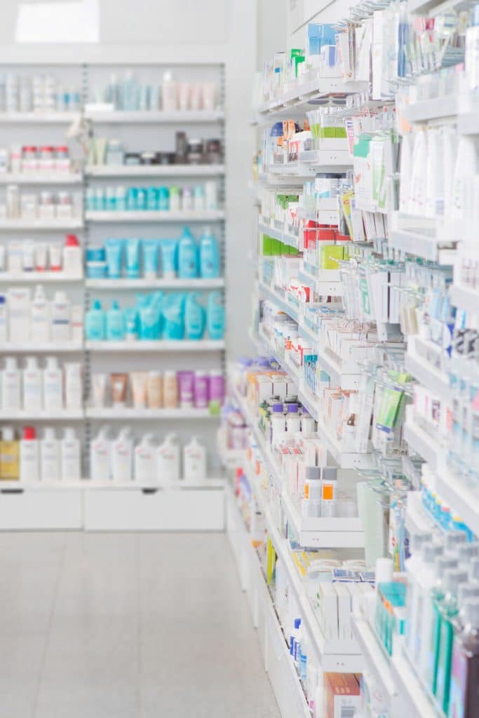 Shelves at a Dutch drugstore.  Read tips for visiting a drugstore in the Netherlands, including helpful tips for what you might have forgotten at home! #amsterdam #holland #travel