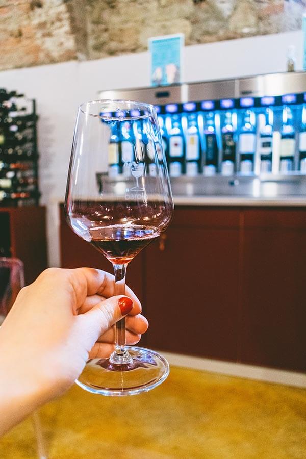Glass of Barolo wine within a Barolo tasting room in Barolo, Italy!