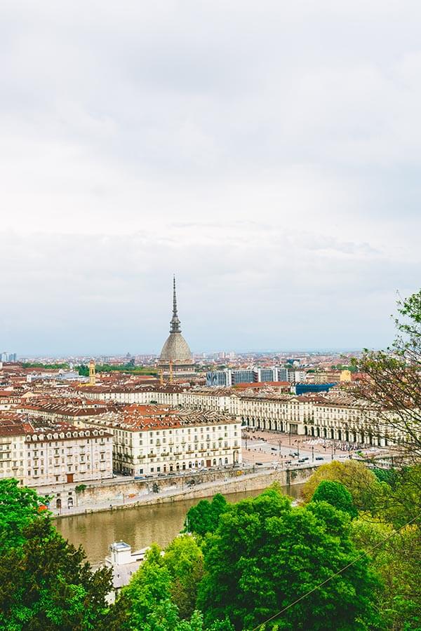 Beautiful view of the Mole Antonelliana in Turin seen from Monte Dei Cappuccini, a beautiful viewpoint in Turin