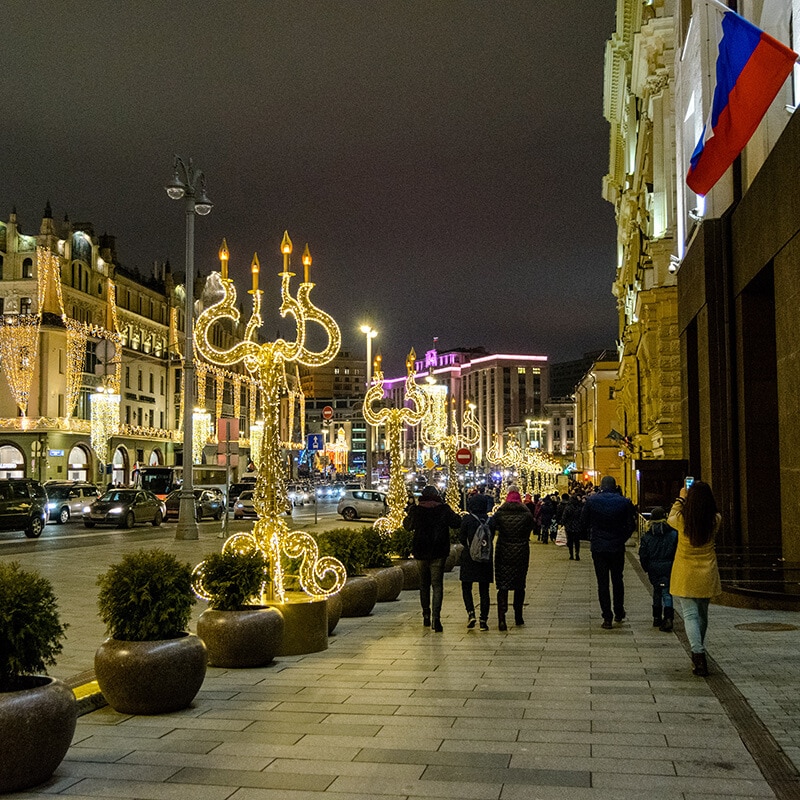 Beautiful lit up street full of Christmas lights in Moscow, Russia.  New Year's Eve is a great time to visit Moscow! #travel #russia #moscow