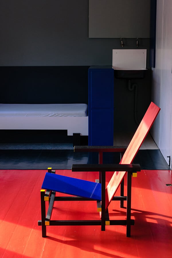 The Red and Blue chair in the Rietveld Schröderhuis.  This iconic piece of furniture in De Stijl was designed by Rietveld himself. #destijl #interiordesign #furniture #design