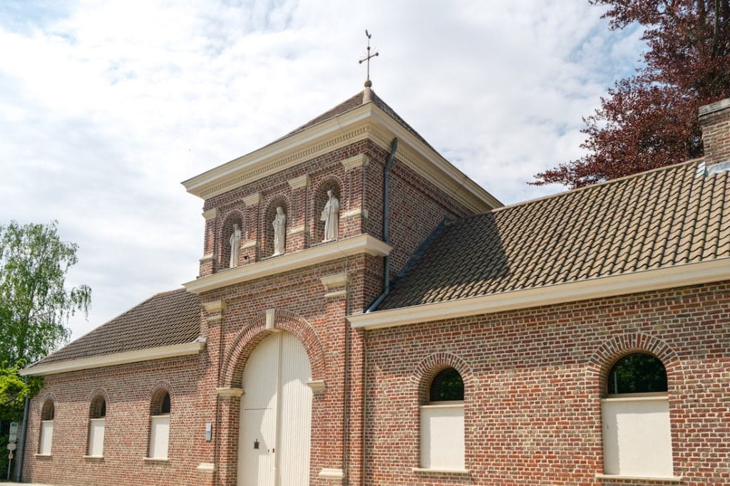 Exterior of the Westvleteren Monastery in Westvleteren, Belgium. Read what it's like to visit the Westvleteren Brewery and about the history of Westvleteren beer. #beer #travel #belgium